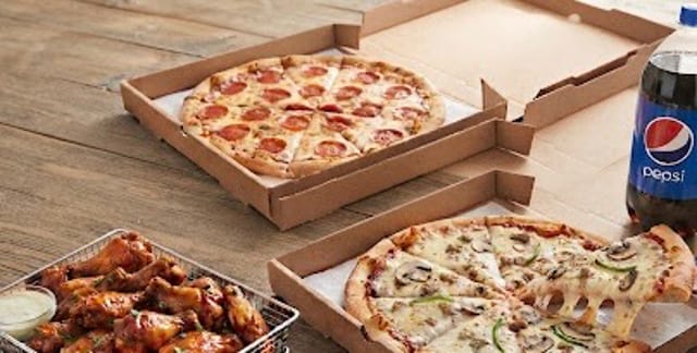 Family Bundle - 2 Large Pizzas, 12 Wings & 2 Liter Soda.