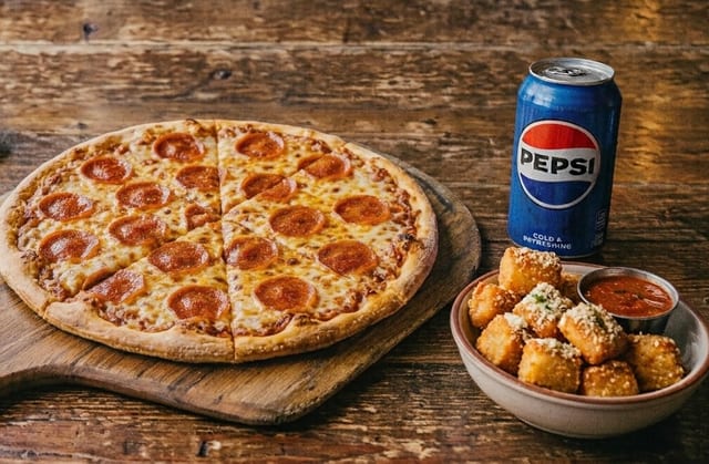 Personal Pack - 1 Medium Pizza, Breadsticks & Soda.